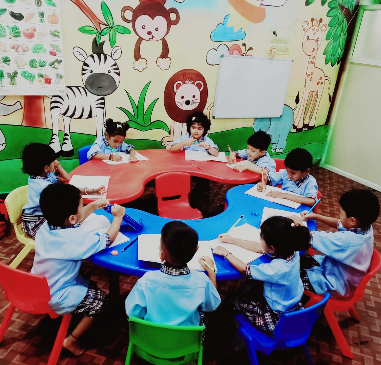 Happy child engaged in creative learning activities at Vijay Smart Kids